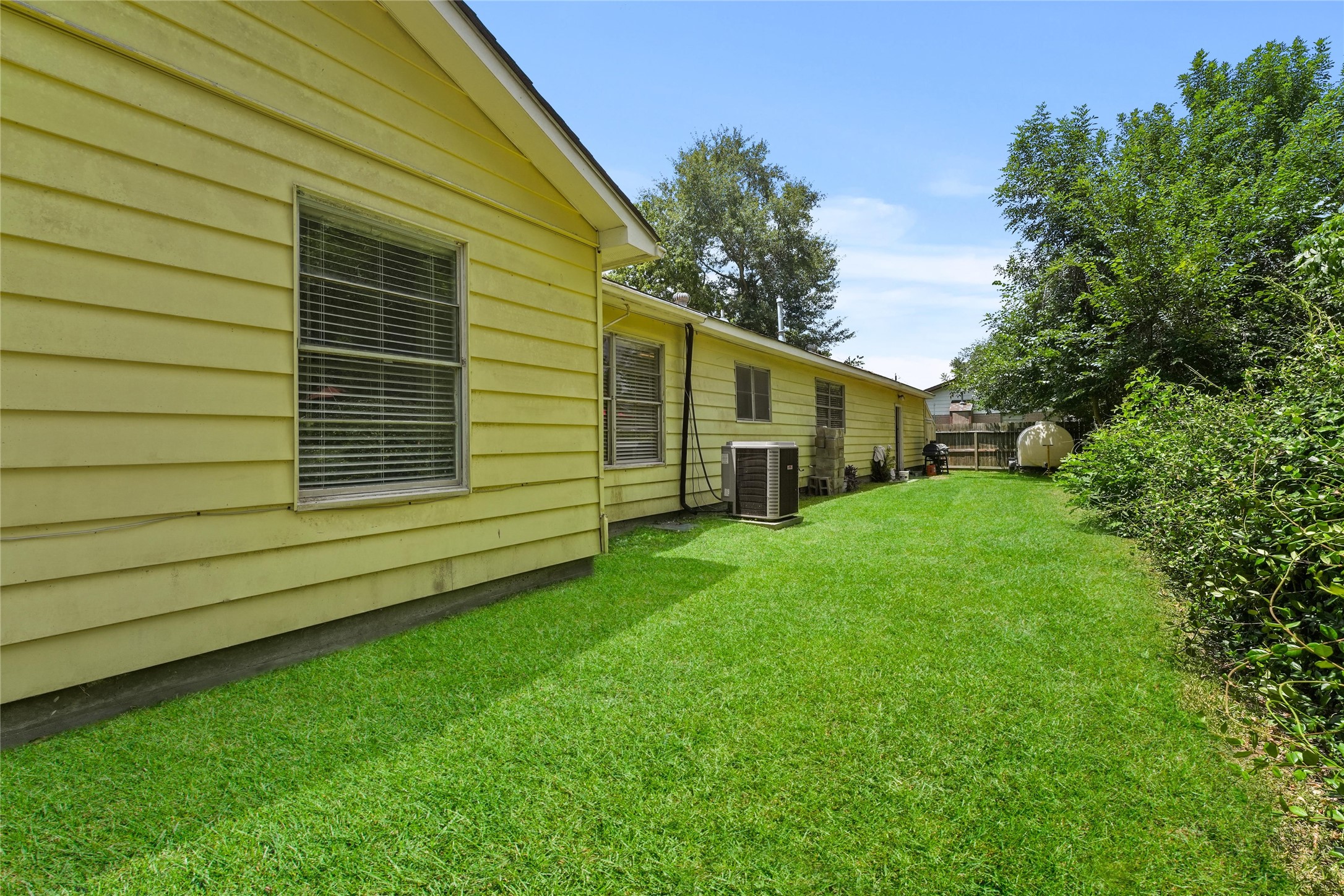 2702 Mckinney Road Baytown, TX 77520 - Photo 17 of 22 a view of a backyard