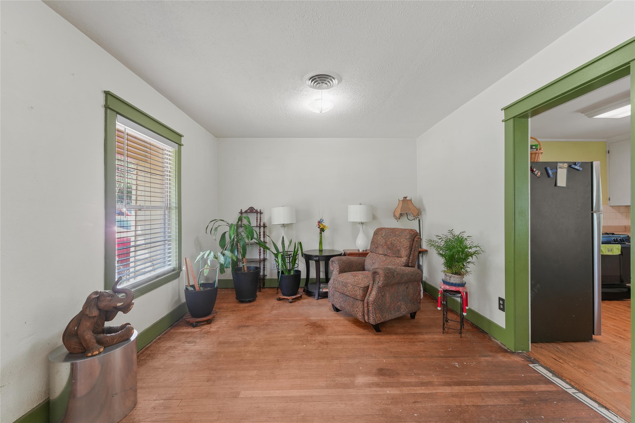 2702 Mckinney Road Baytown, TX 77520 - Photo 9 of 22 a living room with furniture and a window