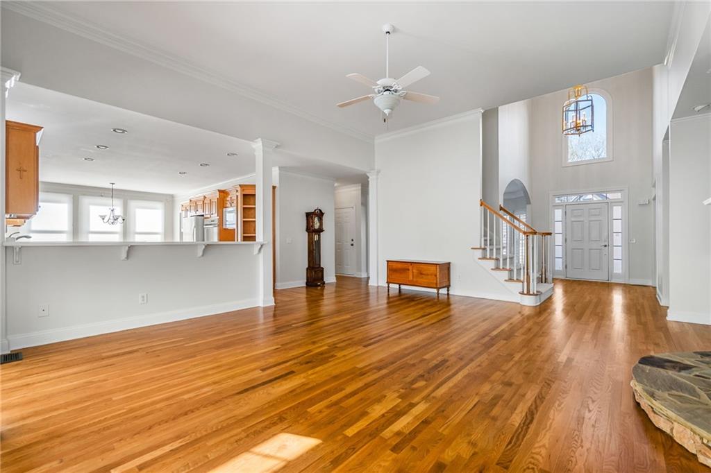 2013 Cockrell Run Northwest Kennesaw, GA 30152 - Photo 16 of 69 a view of a living room and kitchen with stainless steel appliances