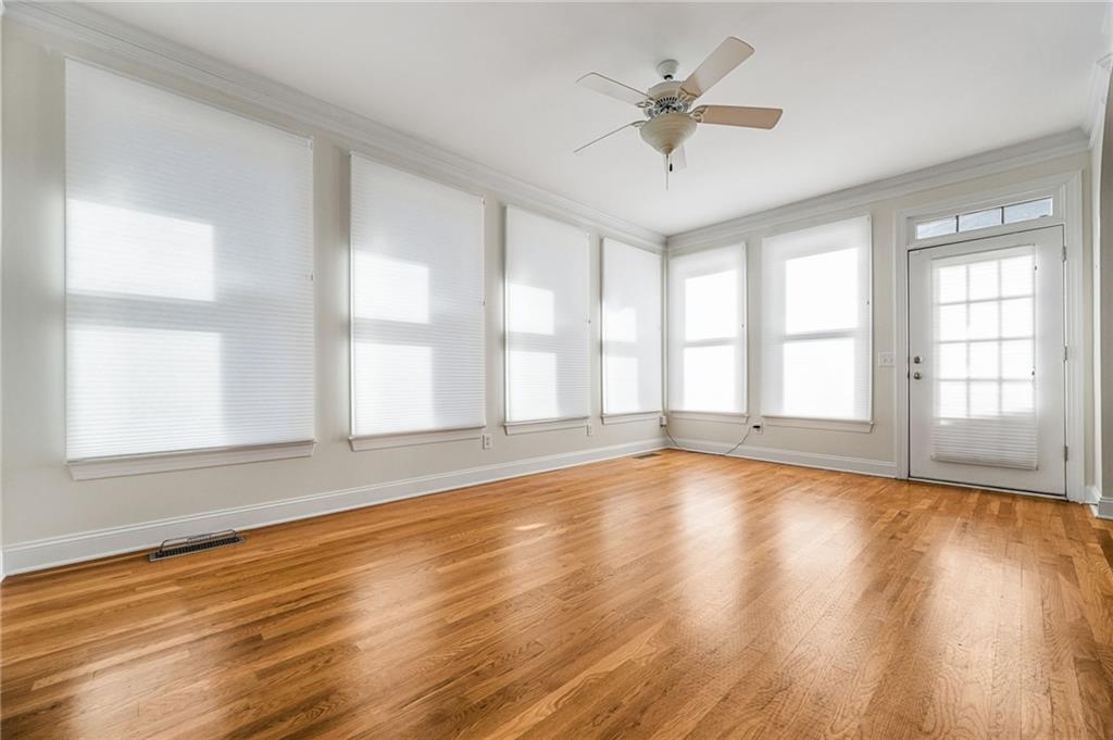 2013 Cockrell Run Northwest Kennesaw, GA 30152 - Photo 17 of 69 a view of an empty room with wooden floor and a window
