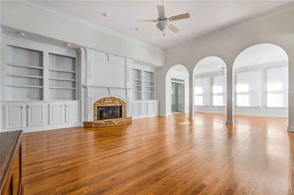 2013 Cockrell Run Northwest Kennesaw, GA 30152 - Photo 2 of 69 a view of an empty room with window and wooden floor