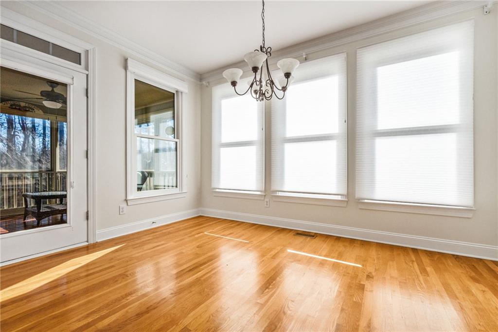 2013 Cockrell Run Northwest Kennesaw, GA 30152 - Photo 22 of 69 a view of an empty room with a window and chandelier