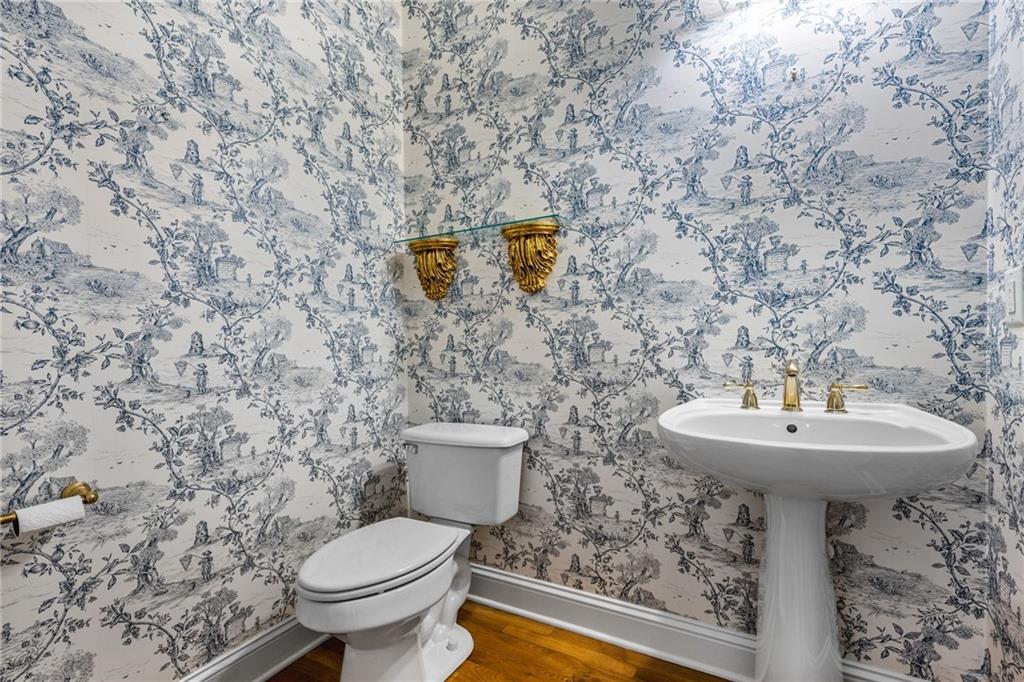 2013 Cockrell Run Northwest Kennesaw, GA 30152 - Photo 26 of 69 a bathroom with a sink and a toilet