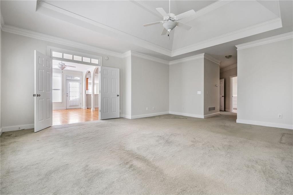 2013 Cockrell Run Northwest Kennesaw, GA 30152 - Photo 27 of 69 a view of a big room with windows and chandelier fan