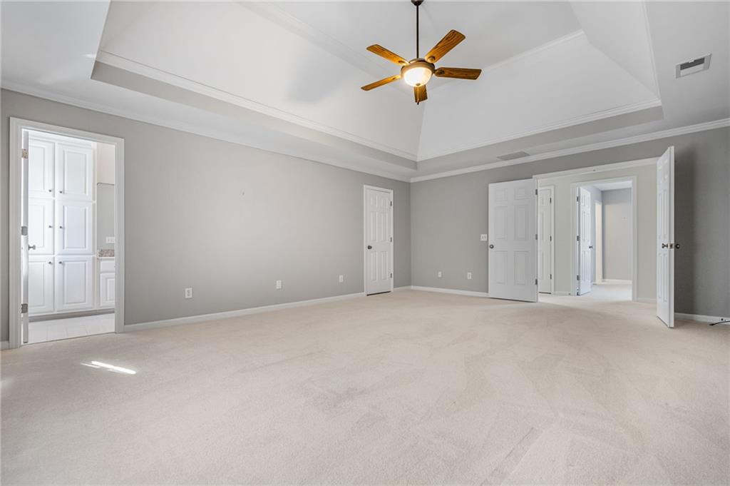 2013 Cockrell Run Northwest Kennesaw, GA 30152 - Photo 36 of 69 an empty room with a ceiling fan and a window