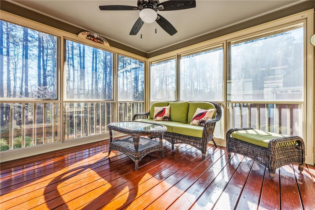 2013 Cockrell Run Northwest Kennesaw, GA 30152 - Photo 53 of 69 a living room with furniture and a wooden floor