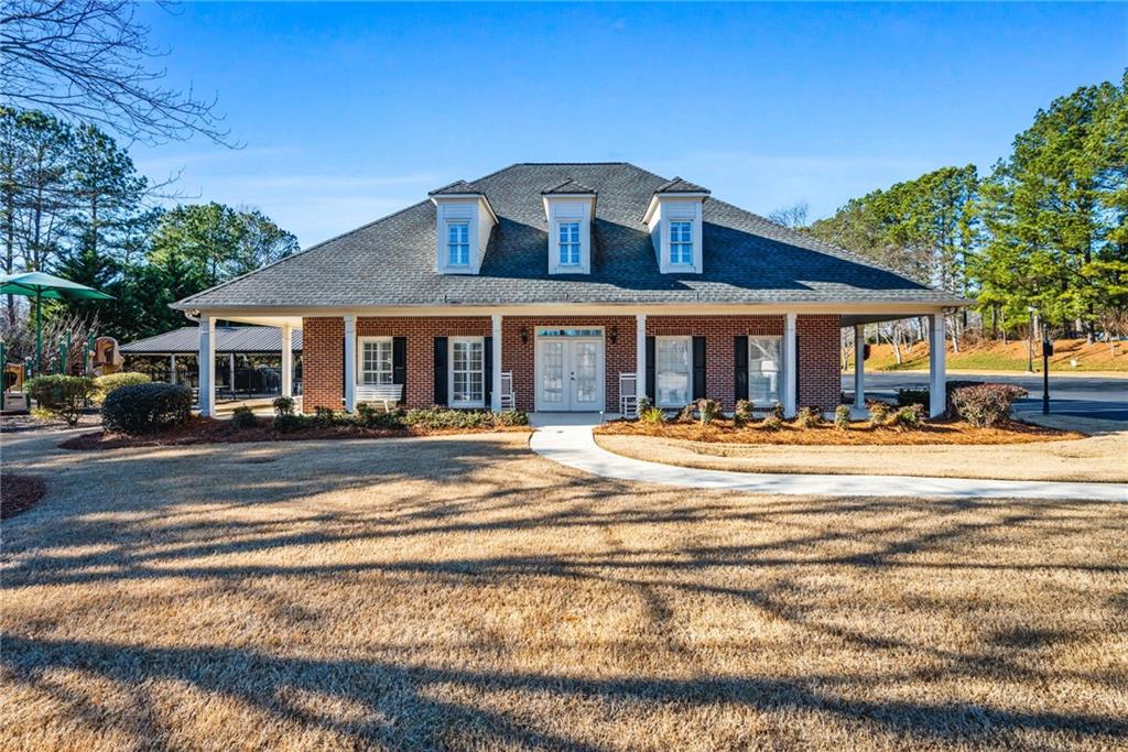 2013 Cockrell Run Northwest Kennesaw, GA 30152 - Photo 66 of 69 a front view of a house with a ocean view