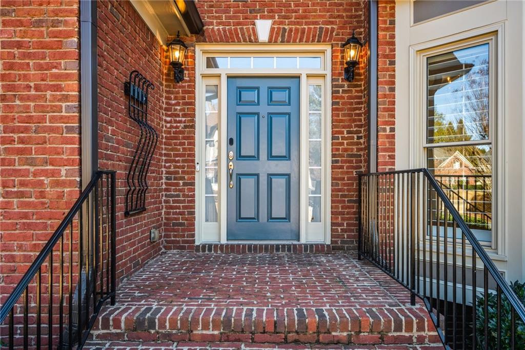 2013 Cockrell Run Northwest Kennesaw, GA 30152 - Photo 9 of 69 a view of a porch with a door and wooden floor