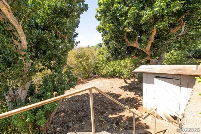 a view of a balcony with an outdoor space