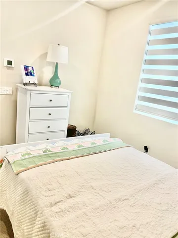a en suite bathroom with a sink and a mirror
