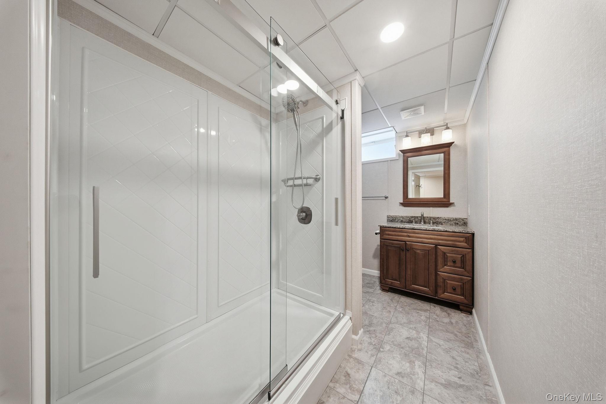 38 Rose Road Woodbourne, NY 12788 - Photo 16 of 35 a bathroom with a bathtub and a shower