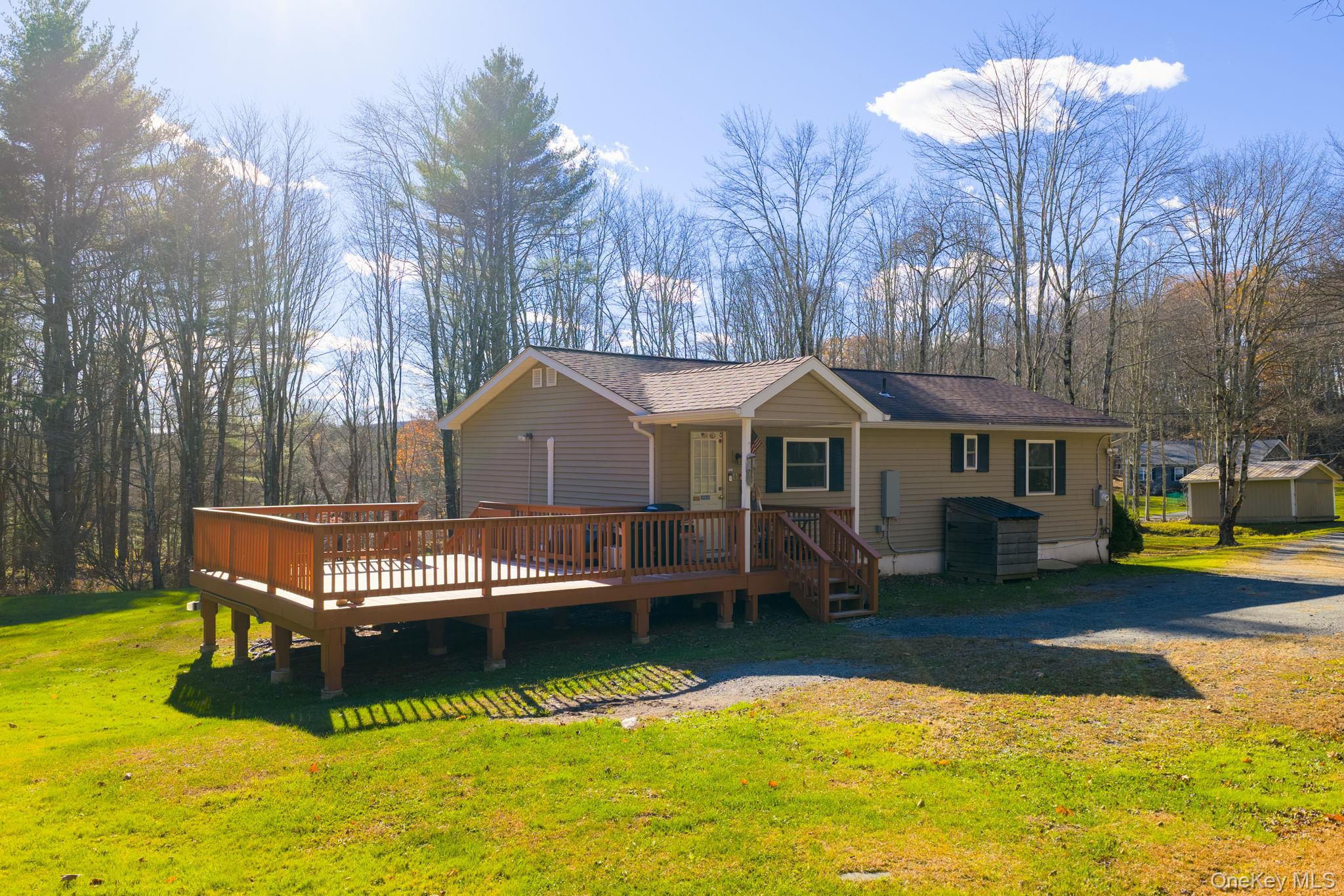 38 Rose Road Woodbourne, NY 12788 - Photo 20 of 35 a swimming pool with outdoor seating and yard