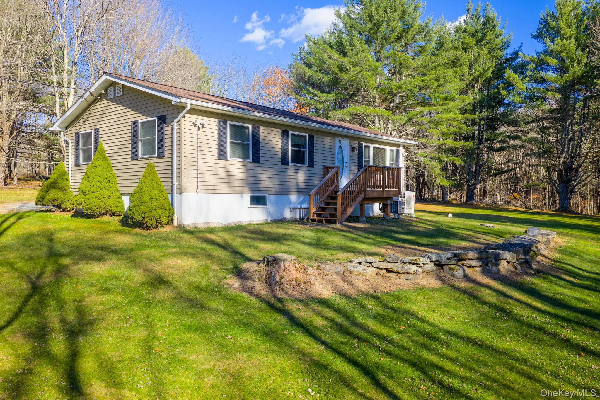38 Rose Road Woodbourne, NY 12788 - Photo 2 of 35 a view of a house with backyard and a tree
