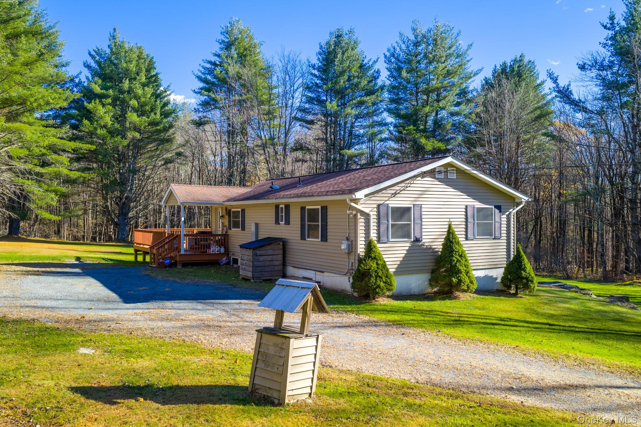38 Rose Road Woodbourne, NY 12788 - Photo 21 of 35 a front view of house with yard and swimming pool