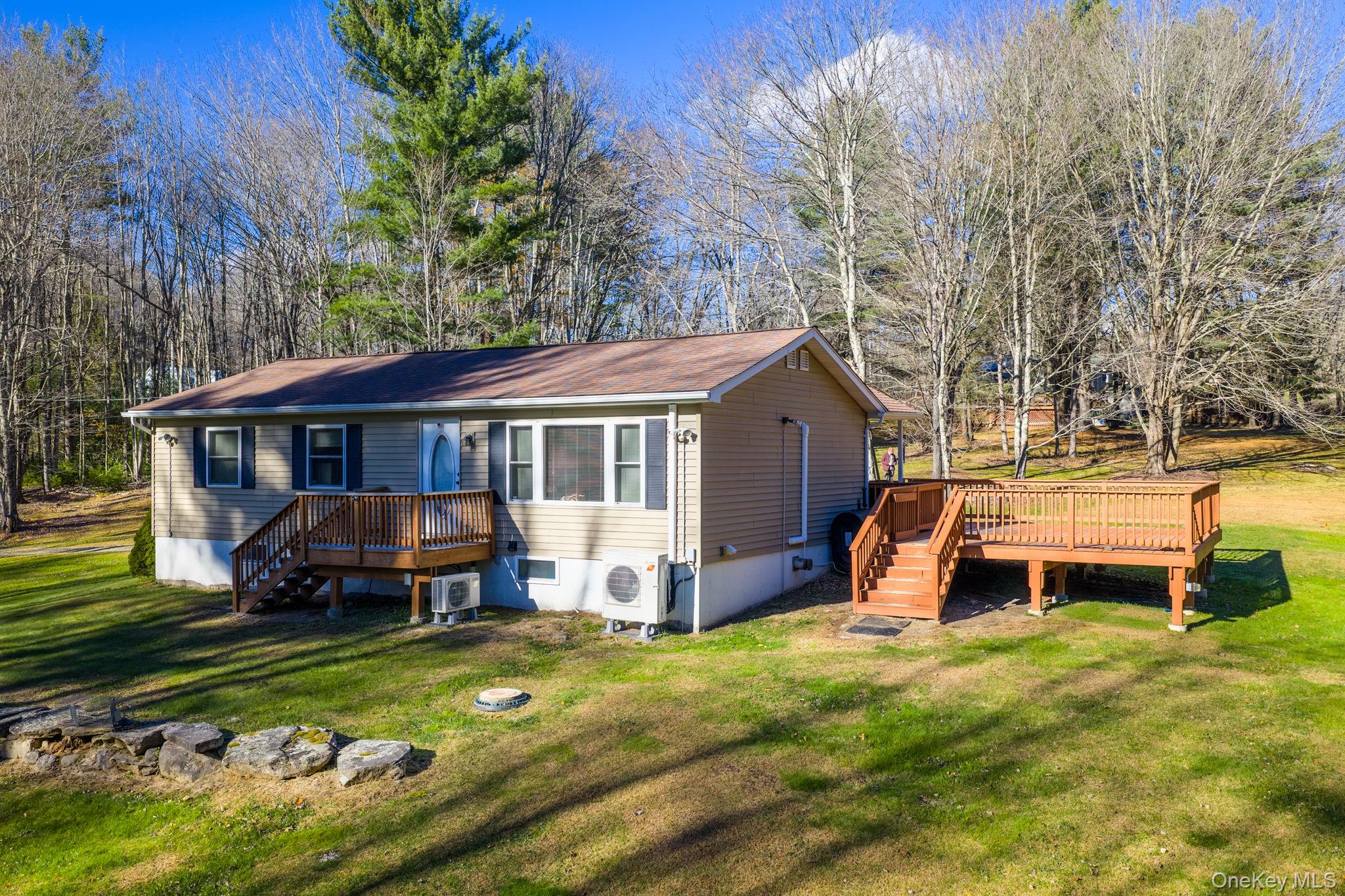 38 Rose Road Woodbourne, NY 12788 - Photo 22 of 35 a front view of house with yard and seating area
