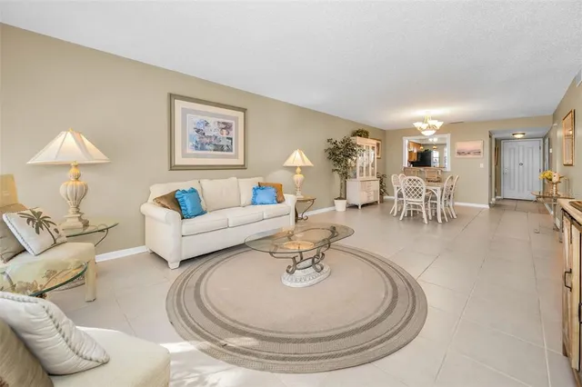 a bathroom with a sink toilet double vanity and shower