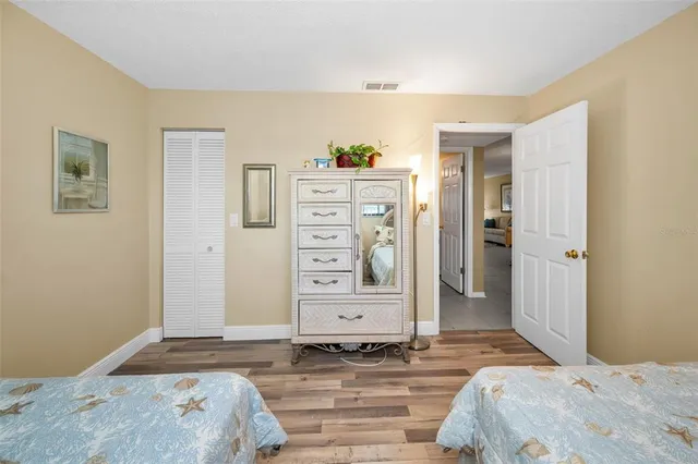 a view of a street with a building in the background