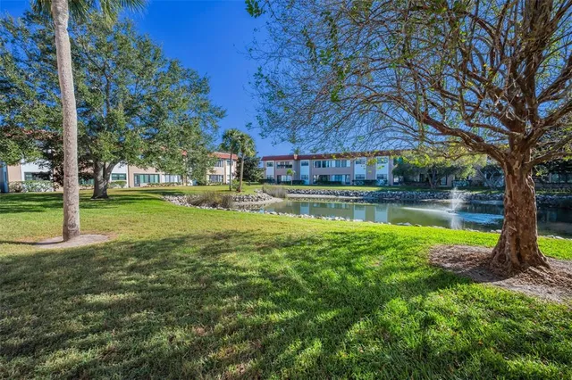 a view of a swimming pool with lounge chair