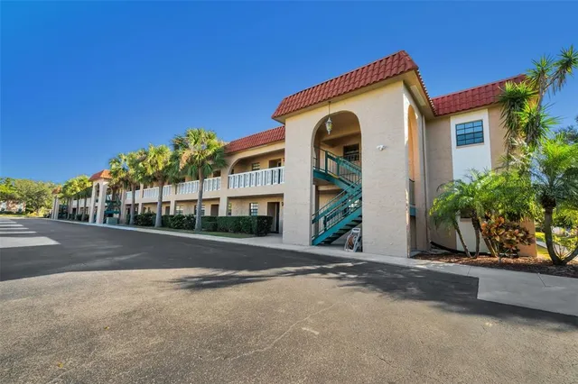 a house with swimming pool in front of it