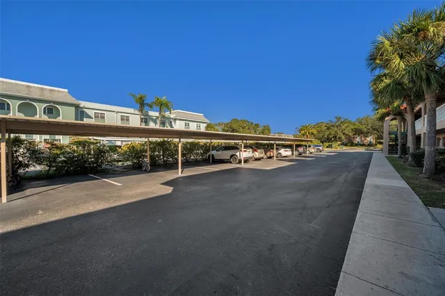 an aerial view of residential houses with outdoor space and garden