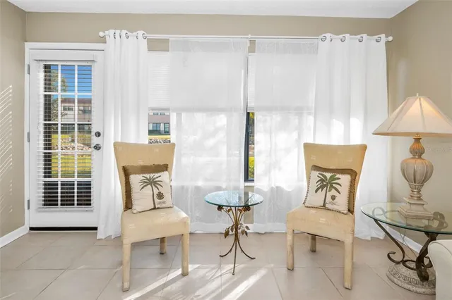 a large kitchen with stainless steel appliances granite countertop a refrigerator and a sink