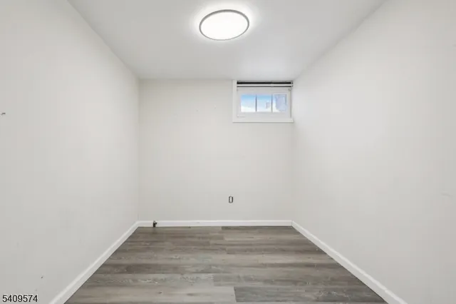 a bedroom with a bed and a cabinets