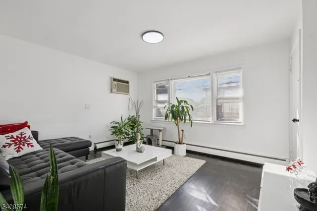 a living room with furniture and window
