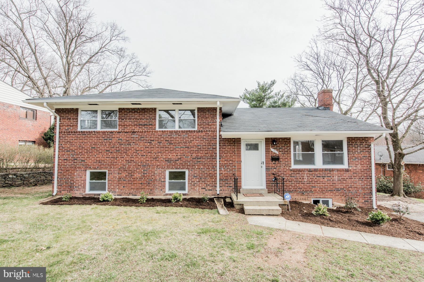 11019 Oakwood Street Silver Spring, MD 20901 - Photo 1 of 30 front view of a house with a yard
