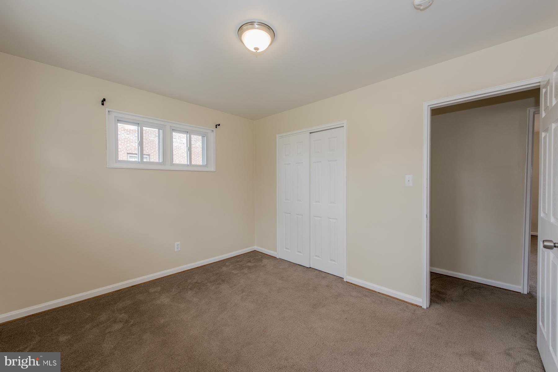11019 Oakwood Street Silver Spring, MD 20901 - Photo 19 of 30 an empty room with a window
