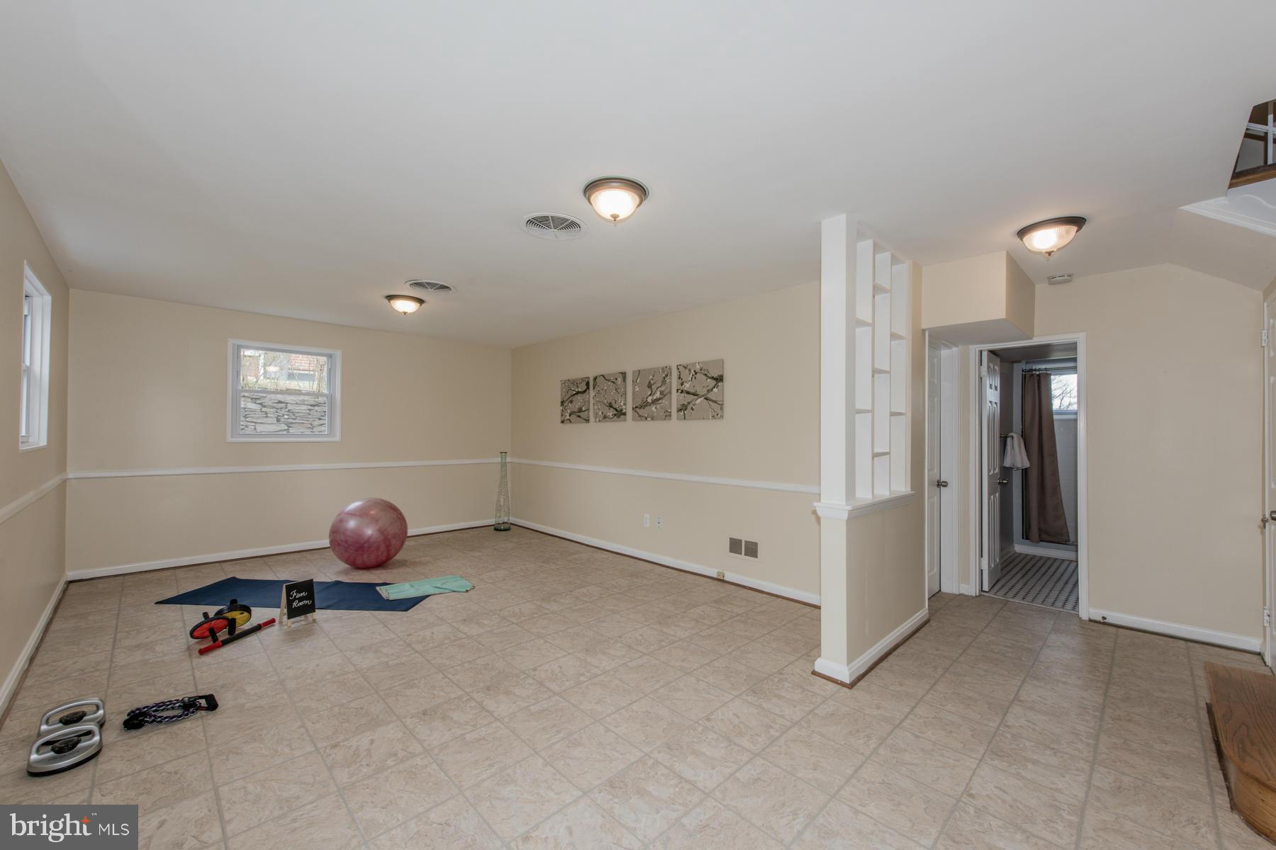 11019 Oakwood Street Silver Spring, MD 20901 - Photo 23 of 30 a view of a room with gym equipment