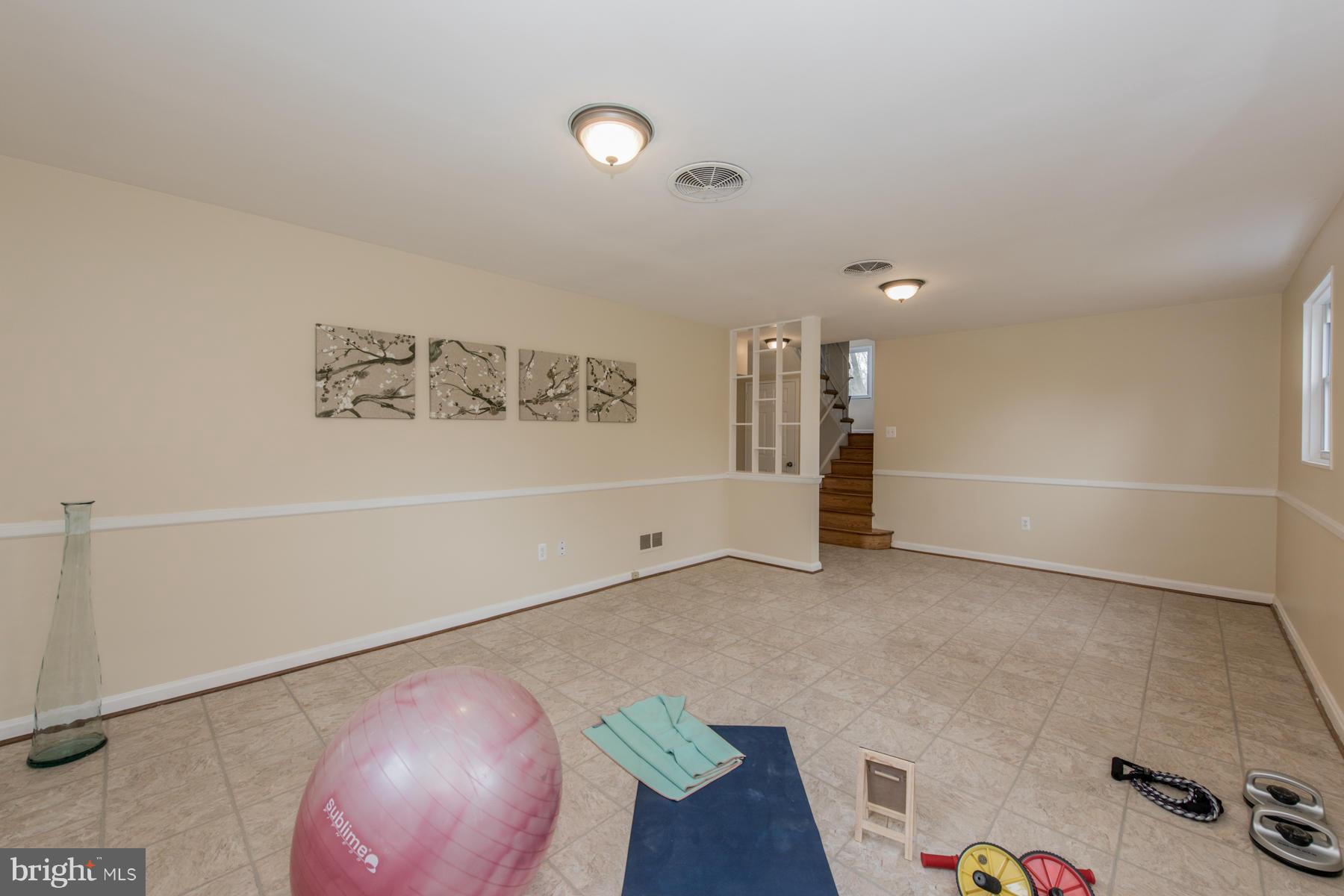 11019 Oakwood Street Silver Spring, MD 20901 - Photo 24 of 30 a view of a livingroom with wooden floor