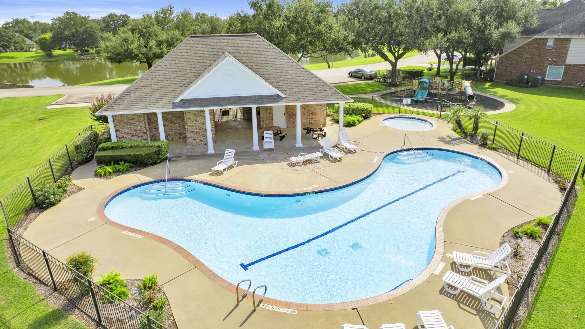 18 Crest Gate Houston, TX 77082 - Photo 27 of 46 a aerial view of a house with swimming pool and patio