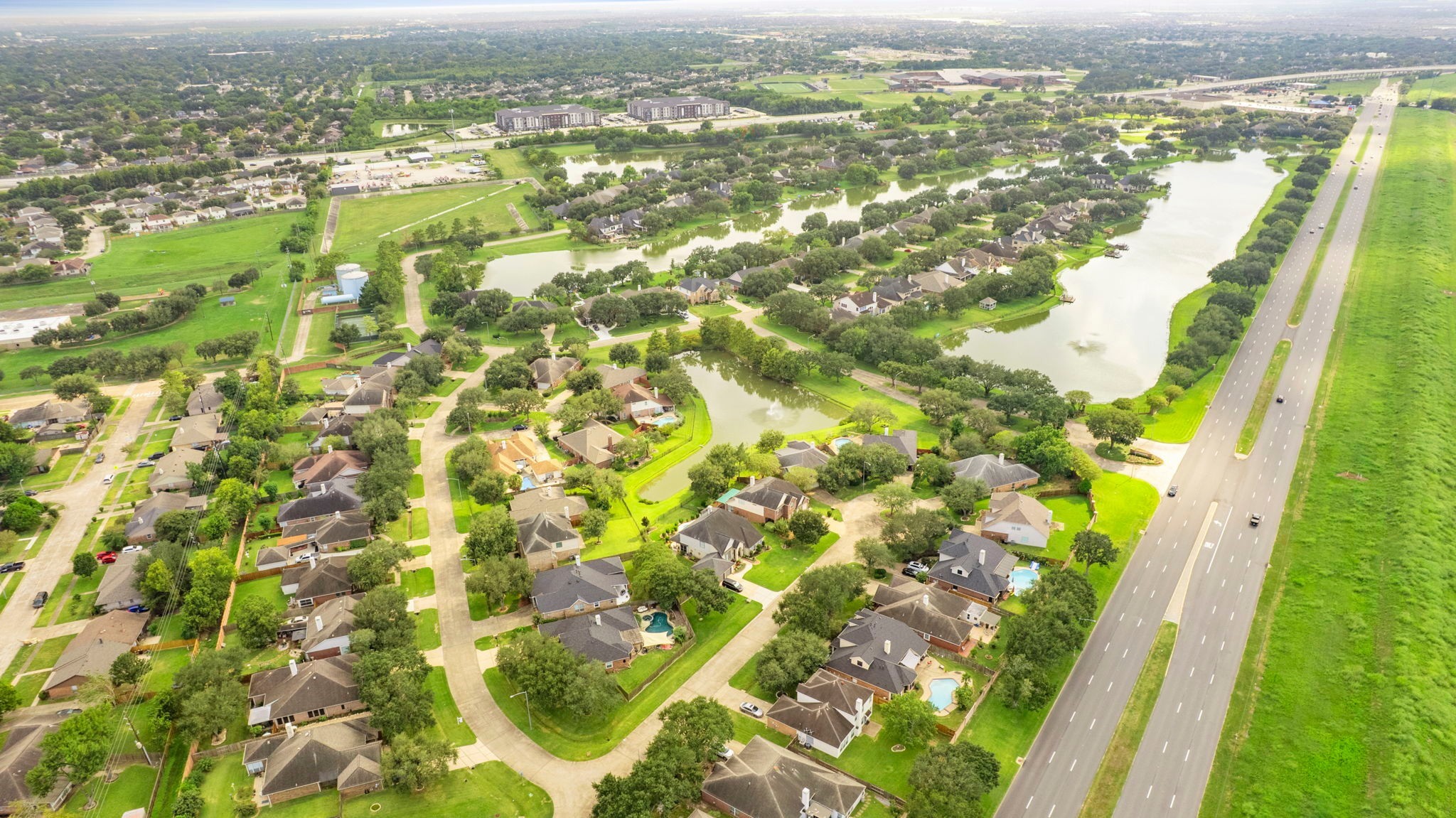 18 Crest Gate Houston, TX 77082 - Photo 38 of 46 an aerial view of residential houses with outdoor space