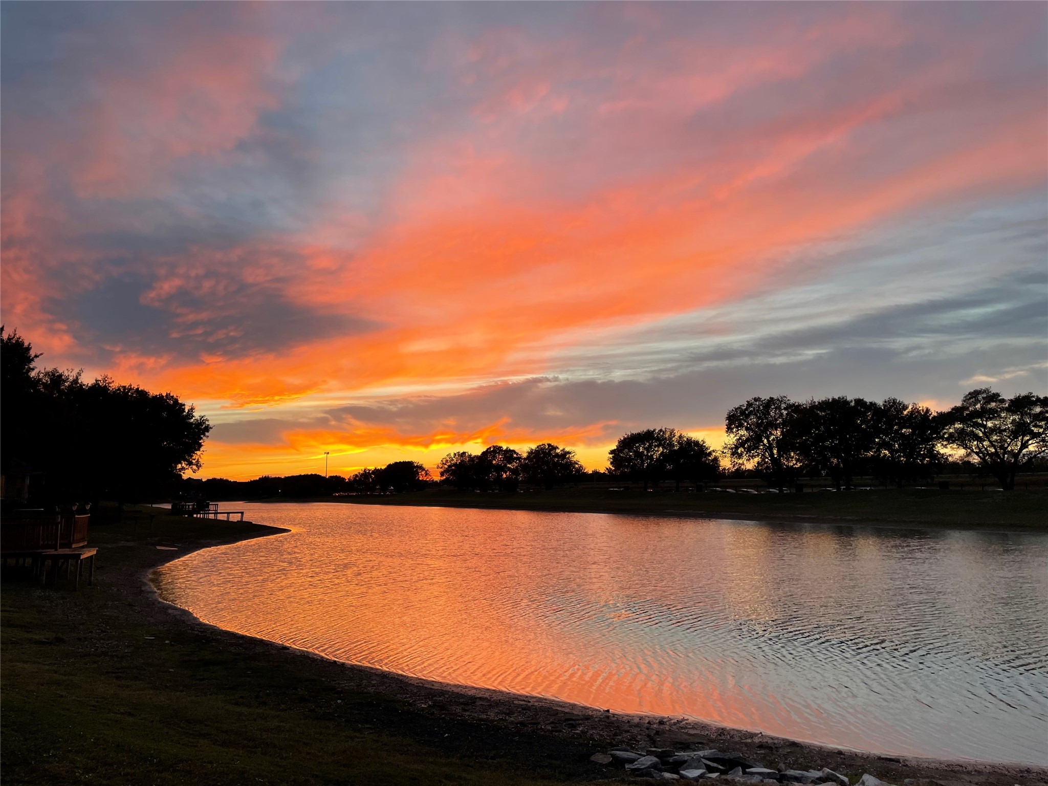 18 Crest Gate Houston, TX 77082 - Photo 43 of 46 a view of lake with sunset