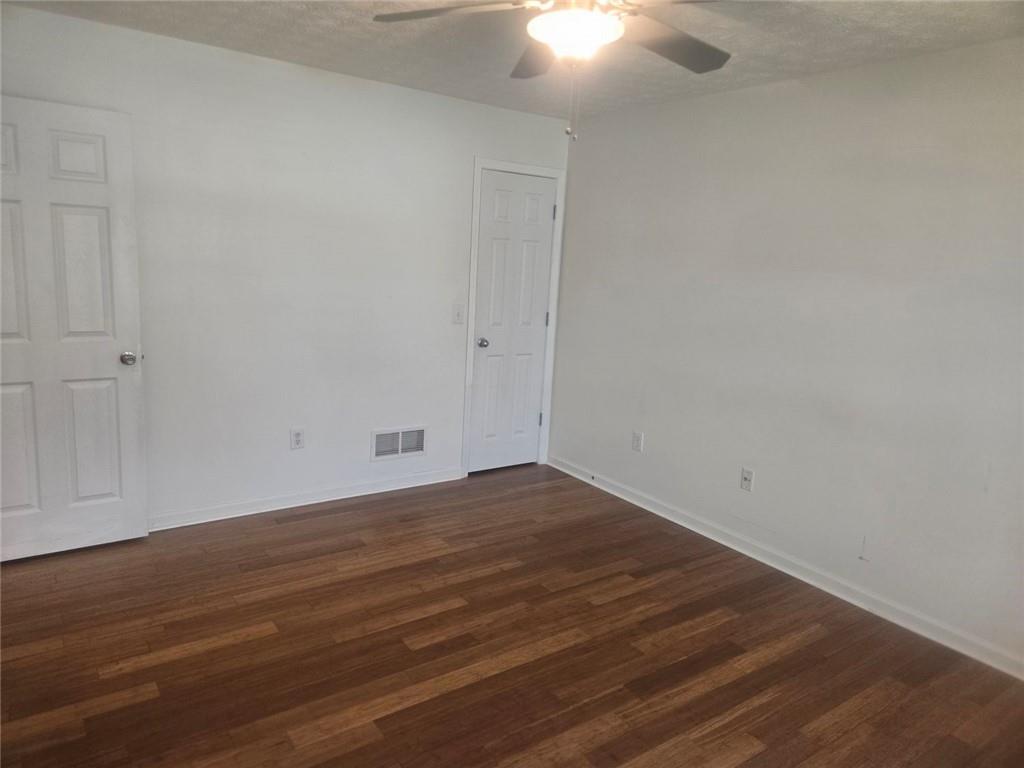 22 Windcrest Keep Covington, GA 30016 - Photo 24 of 32 a view of empty room with wooden floor