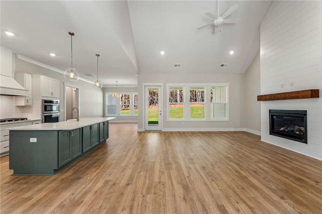 112 Commonwealth Drive Ninety Six, SC 29666 - Photo 8 of 21 Great room / kitchen - Images are of a different home with a similar floor plan with different interior selections