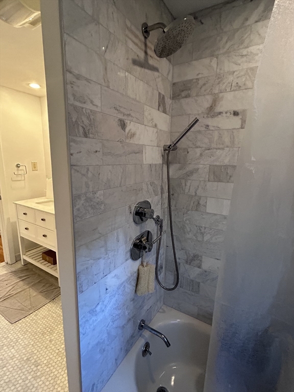 44 Marla Circle Newton, MA 02459 - Photo 16 of 23 a bathroom with a granite countertop shower