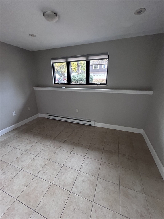 44 Marla Circle Newton, MA 02459 - Photo 20 of 23 an empty room with windows