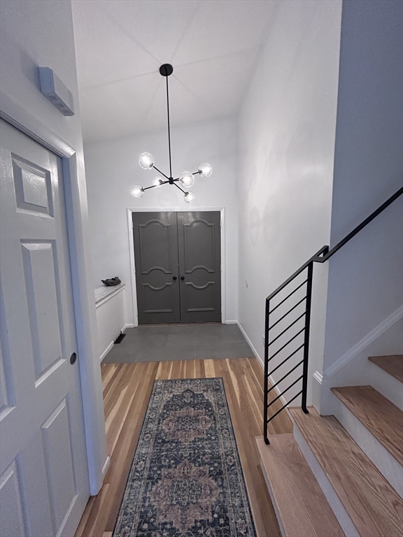 44 Marla Circle Newton, MA 02459 - Photo 2 of 23 a view of a hallway view with staircase