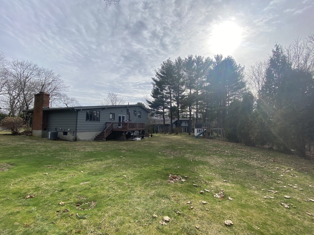 44 Marla Circle Newton, MA 02459 - Photo 23 of 23 a view of a house with a yard