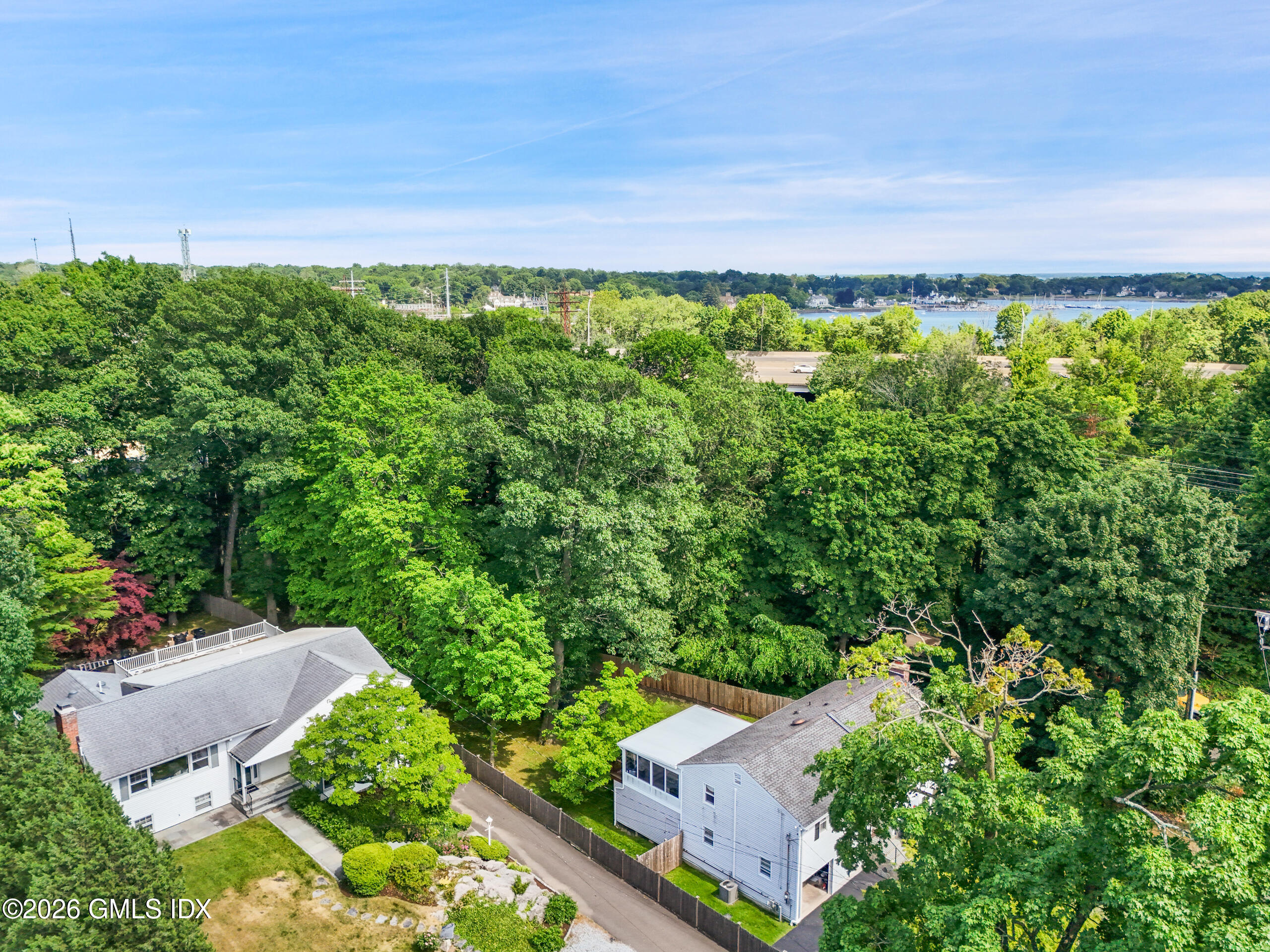 33 Sachem Road Greenwich, CT 06830 - Photo 30 of 35 an aerial view of a house with a yard