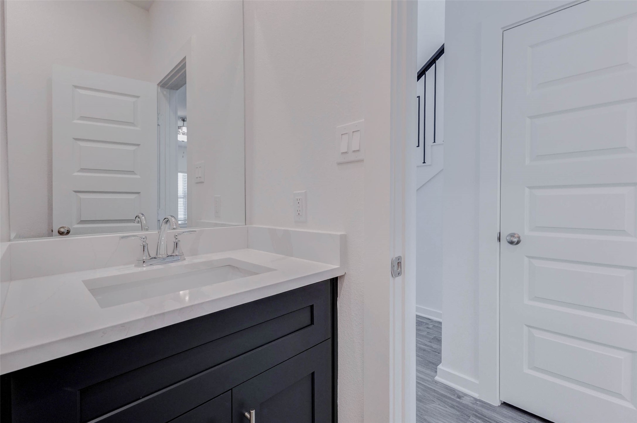 1038 Elsinore Drive Rosharon, TX 77583 - Photo 27 of 27 This bright upstairs bedroom features vaulted ceilings, soft carpeting, and dual windows that fill the room with natural light throughout the day. A modern ceiling fan provides added comfort while the spacious floor plan offers plenty of room for larger furniture arrangements. The calming neutral tones create a relaxing environment that easily adapts to personal style, making this space perfect for rest and relaxation.