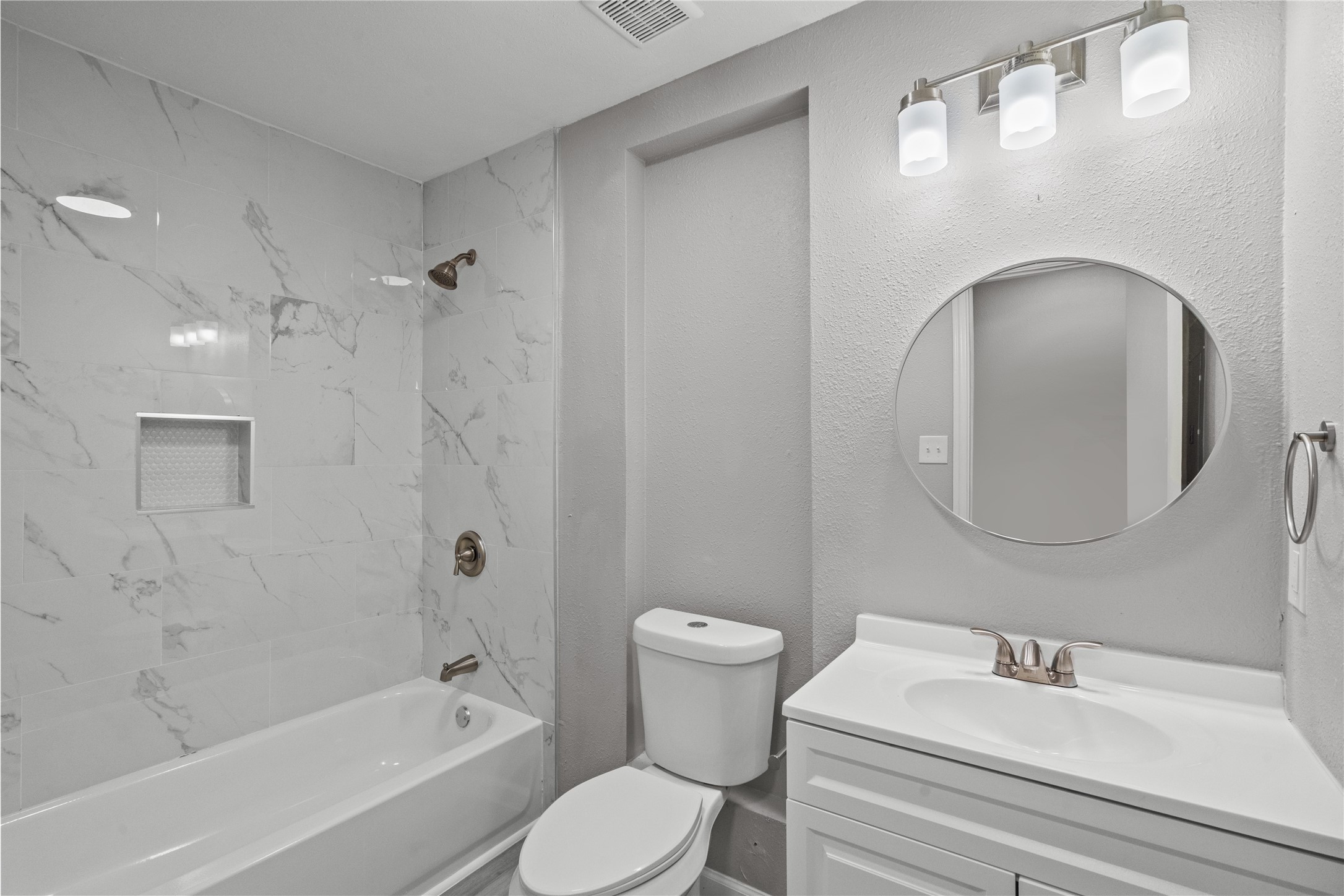 20575 Kings Road New Caney, TX 77357 - Photo 13 of 19 The NEW bathroom is sleek and modern.