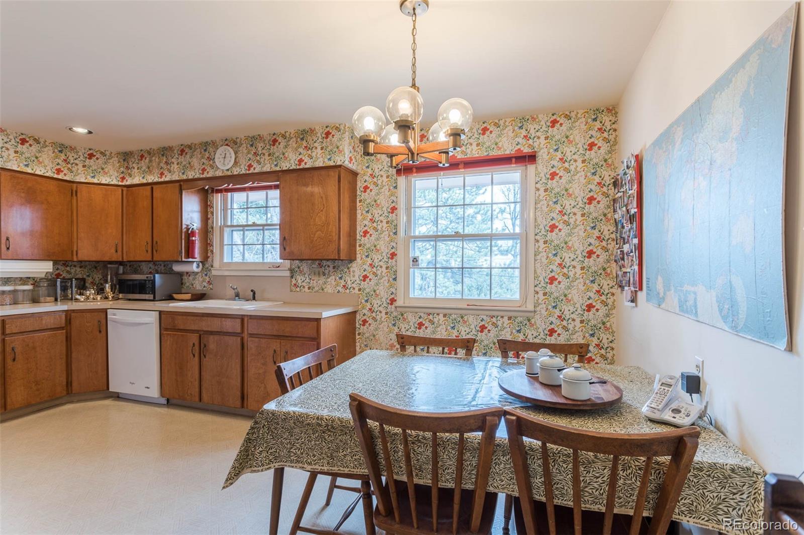 870 Willowbrook Road Boulder, CO 80302 - Photo 11 of 30 a kitchen with a table and chairs in it