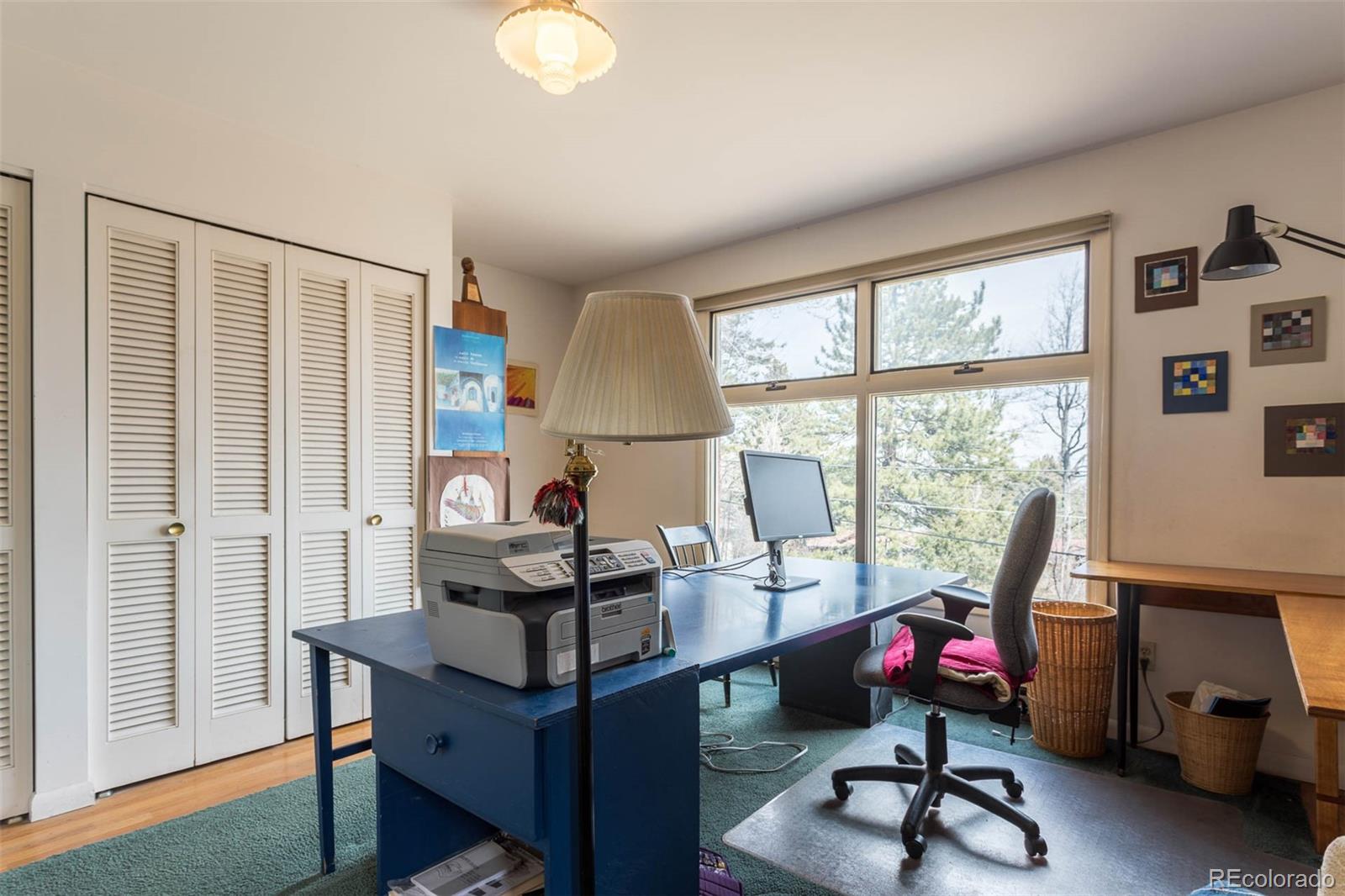 870 Willowbrook Road Boulder, CO 80302 - Photo 14 of 30 a view of a workspace with furniture and a window