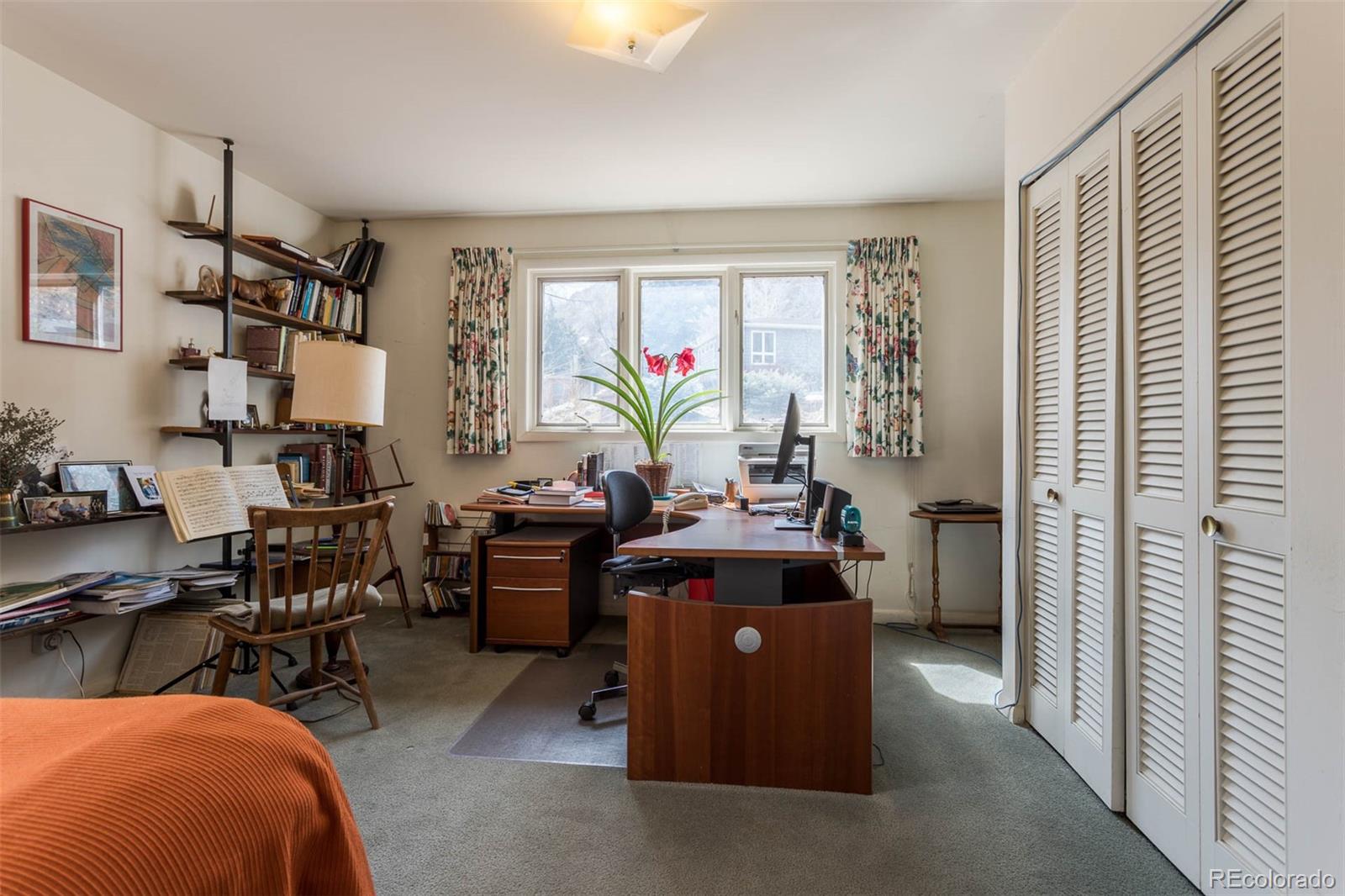 870 Willowbrook Road Boulder, CO 80302 - Photo 16 of 30 a living room filled with furniture