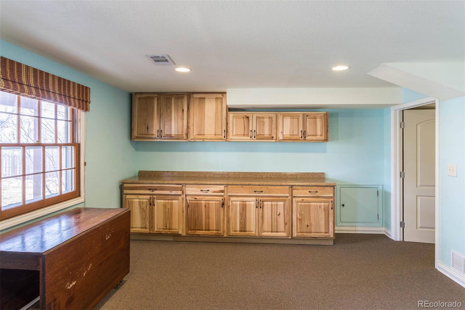 870 Willowbrook Road Boulder, CO 80302 - Photo 20 of 30 a view of an empty room with window