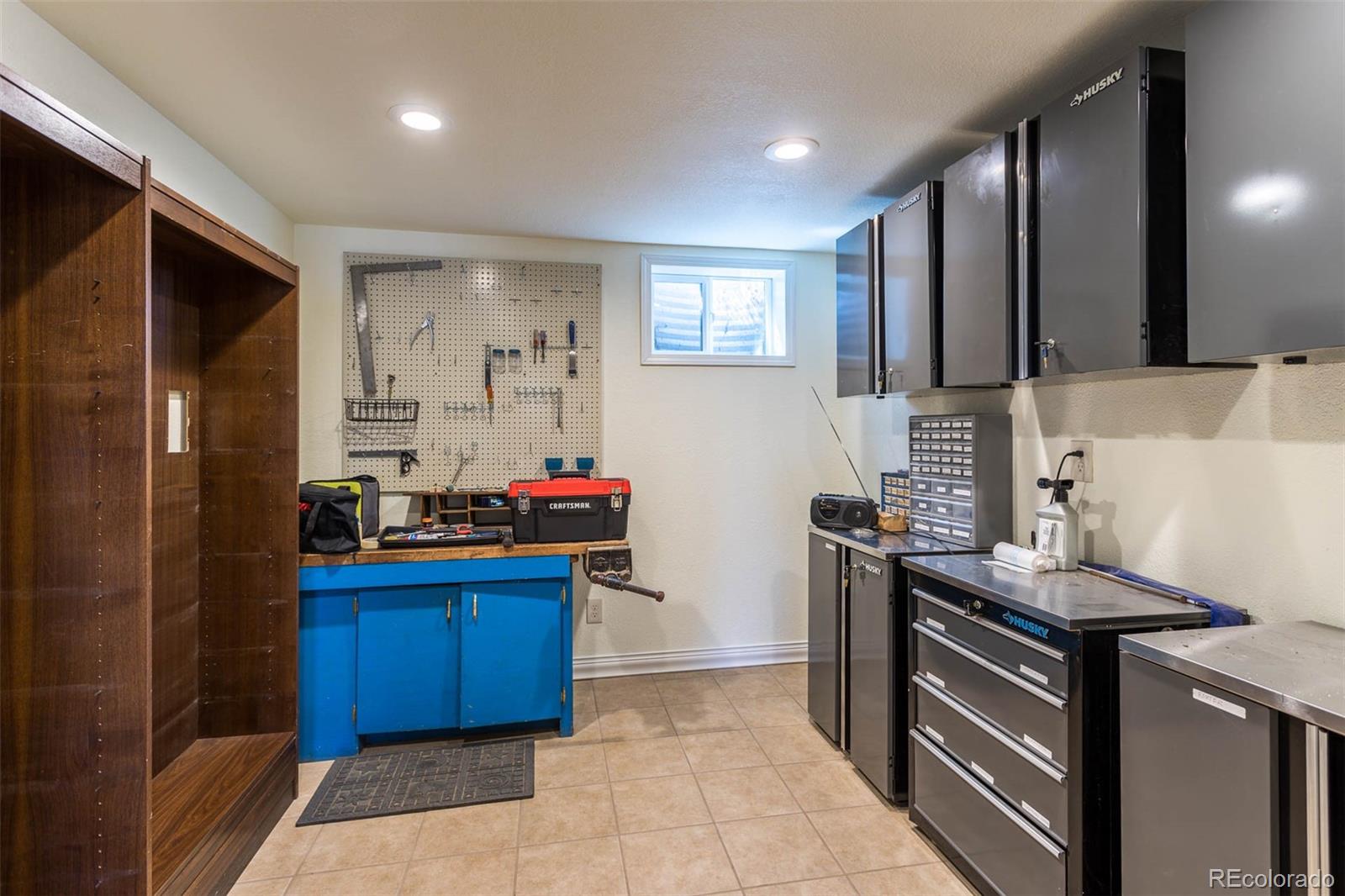 870 Willowbrook Road Boulder, CO 80302 - Photo 21 of 30 a kitchen with stainless steel appliances granite countertop a stove refrigerator and sink