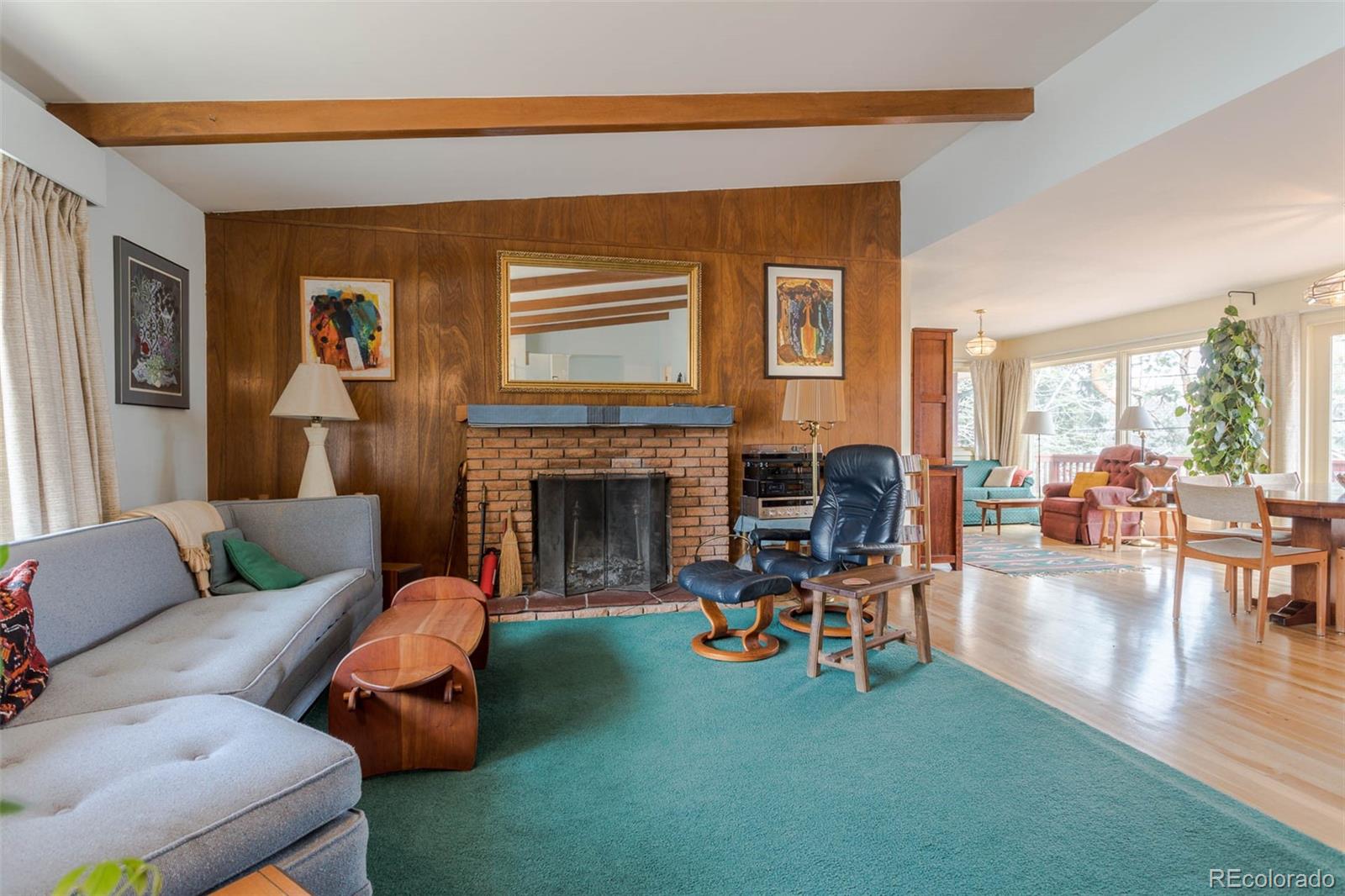870 Willowbrook Road Boulder, CO 80302 - Photo 5 of 30 a living room with furniture and a fireplace