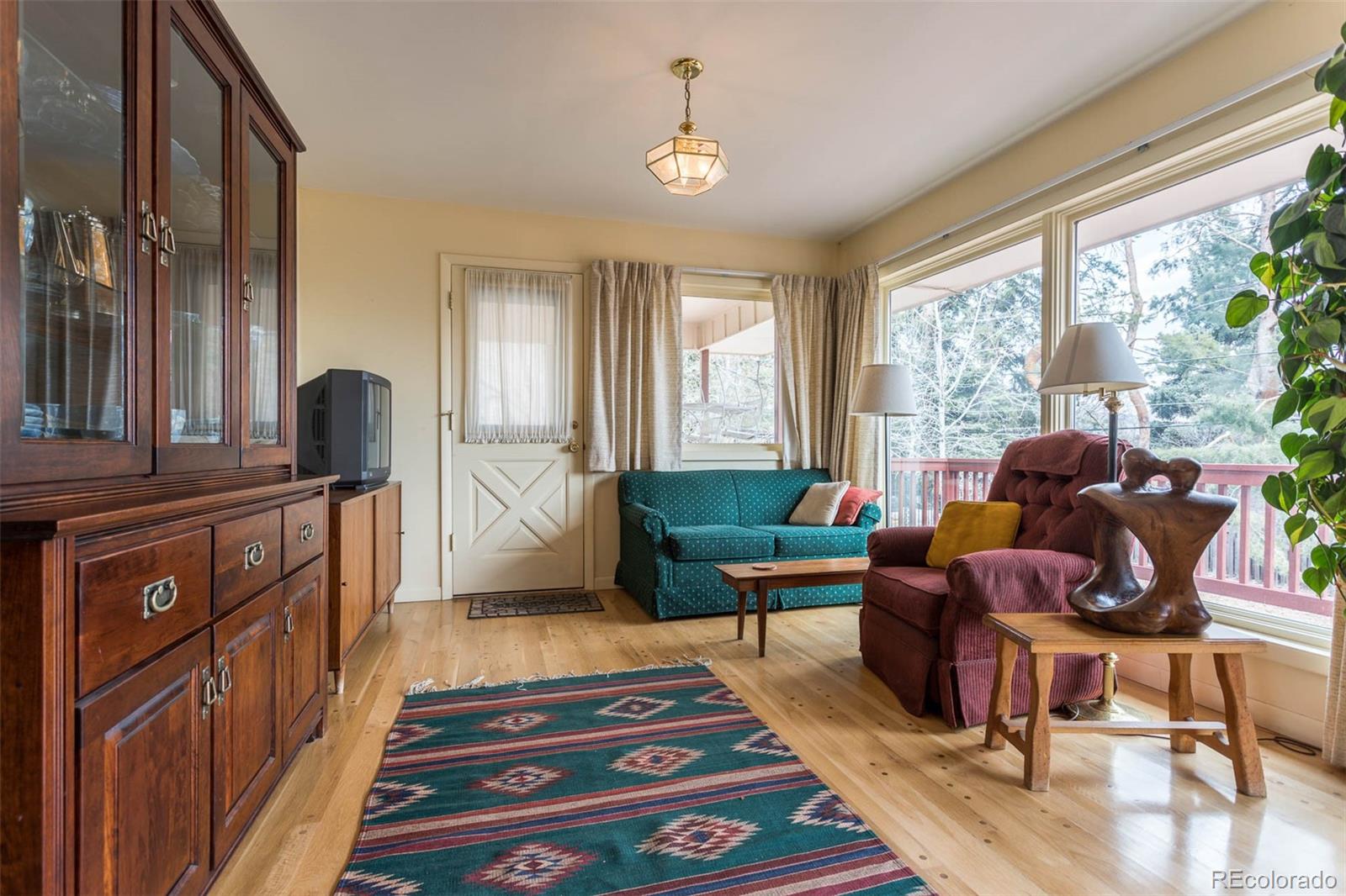 870 Willowbrook Road Boulder, CO 80302 - Photo 7 of 30 a living room with furniture and a window
